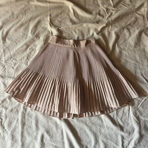 tan pleated skirt